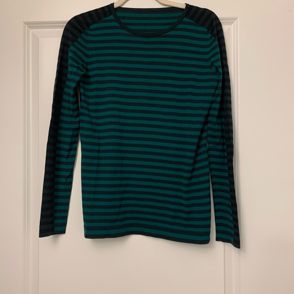 Akris stripes top with alternate stripe detail down sleeves.